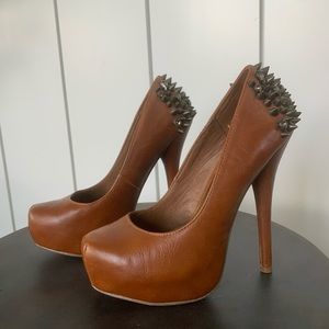 Brown pumps with spikes by WILD PAIR